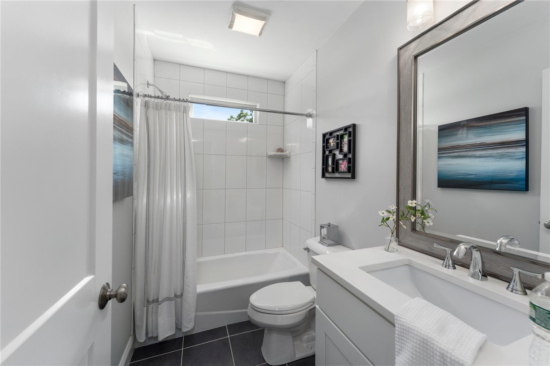 297 Gorton Lake Boulevard Warwick, RI 02886 - Photo 23 of 38 Upper level bathroom full tub and shower