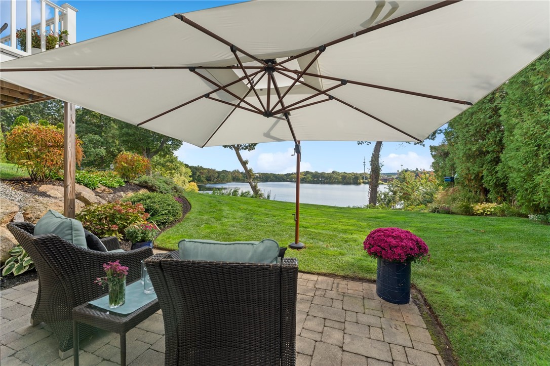297 Gorton Lake Boulevard Warwick, RI 02886 - Photo 31 of 38 The lower level opens to the quaint patio with water views