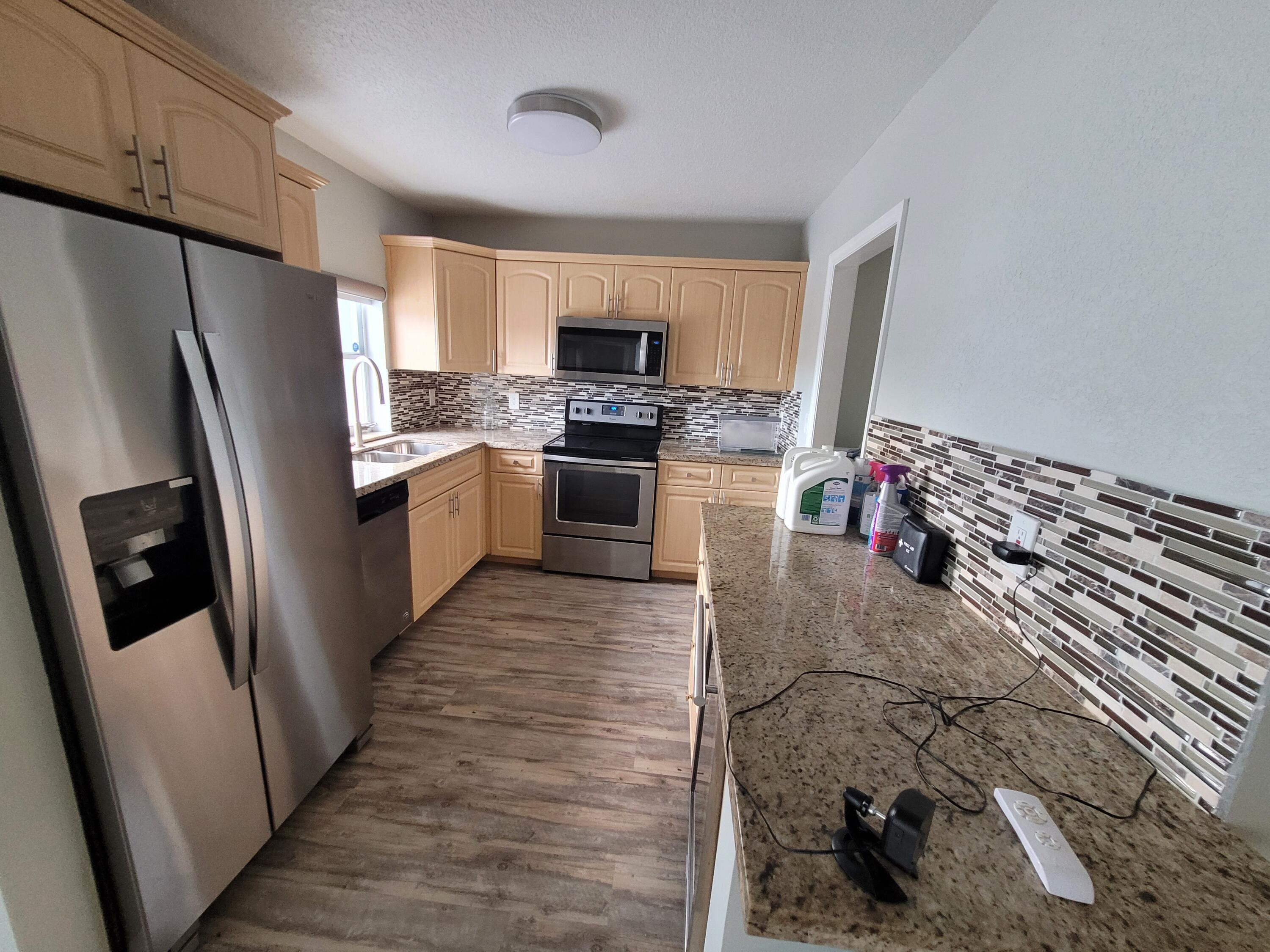 516 Northwest 54th Street Boca Raton, FL 33487 - Photo 3 of 22 20220418_162452