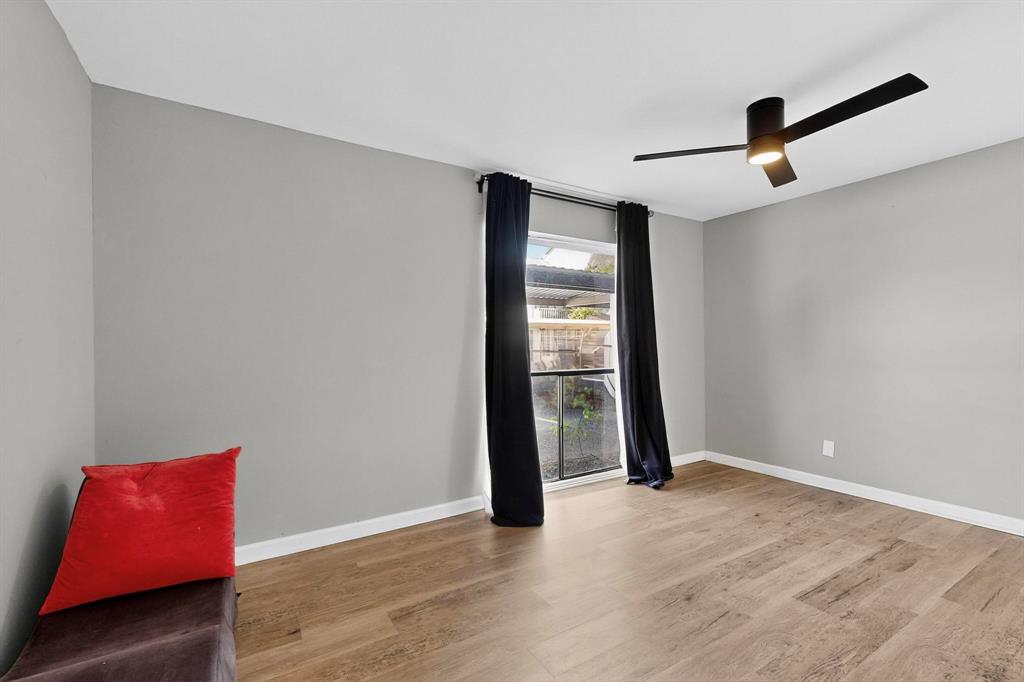 4535 North O'Connor Road, Unit 1210 Irving, TX 75062 - Photo 13 of 20 an empty room with closet and windows