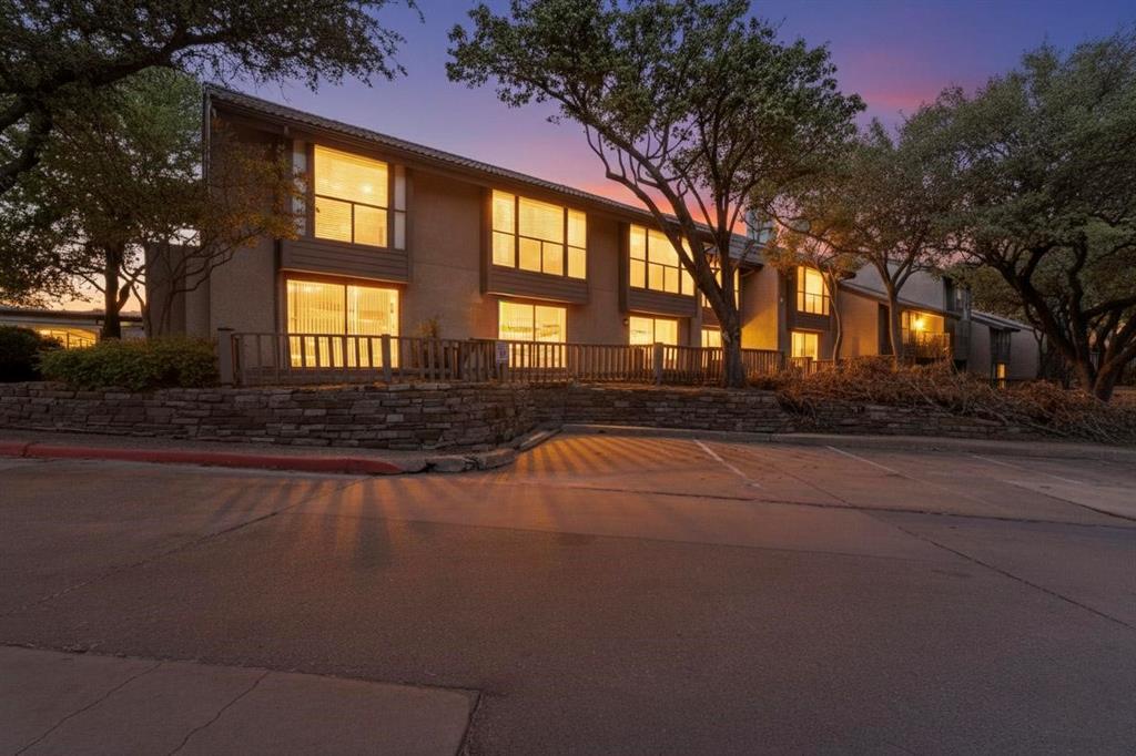 4535 North O'Connor Road, Unit 1210 Irving, TX 75062 - Photo 20 of 20 a front view of a house with a yard