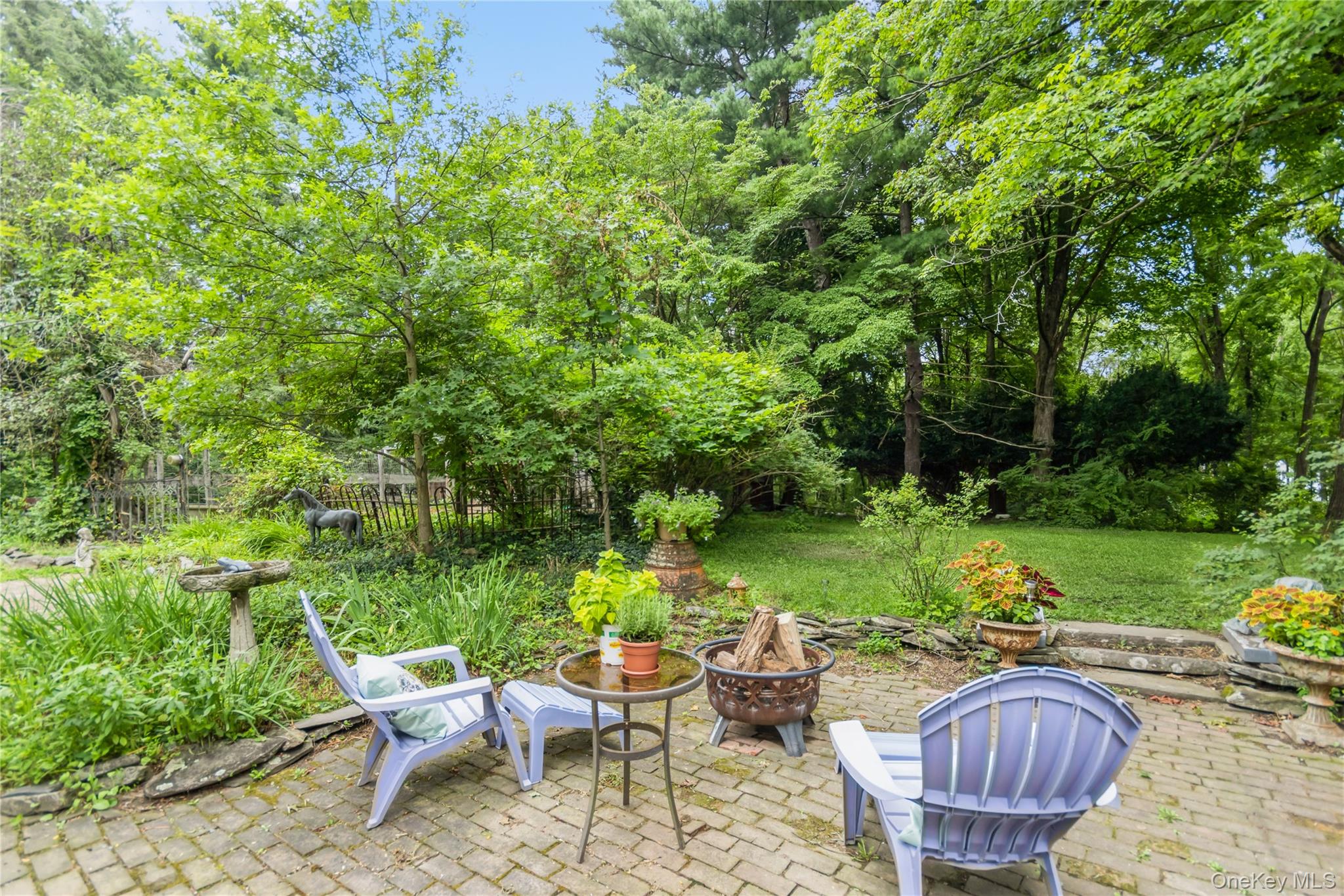 93 Widmer Road Wappingers Falls, NY 12590 - Photo 34 of 45 View of patio featuring a fire pit