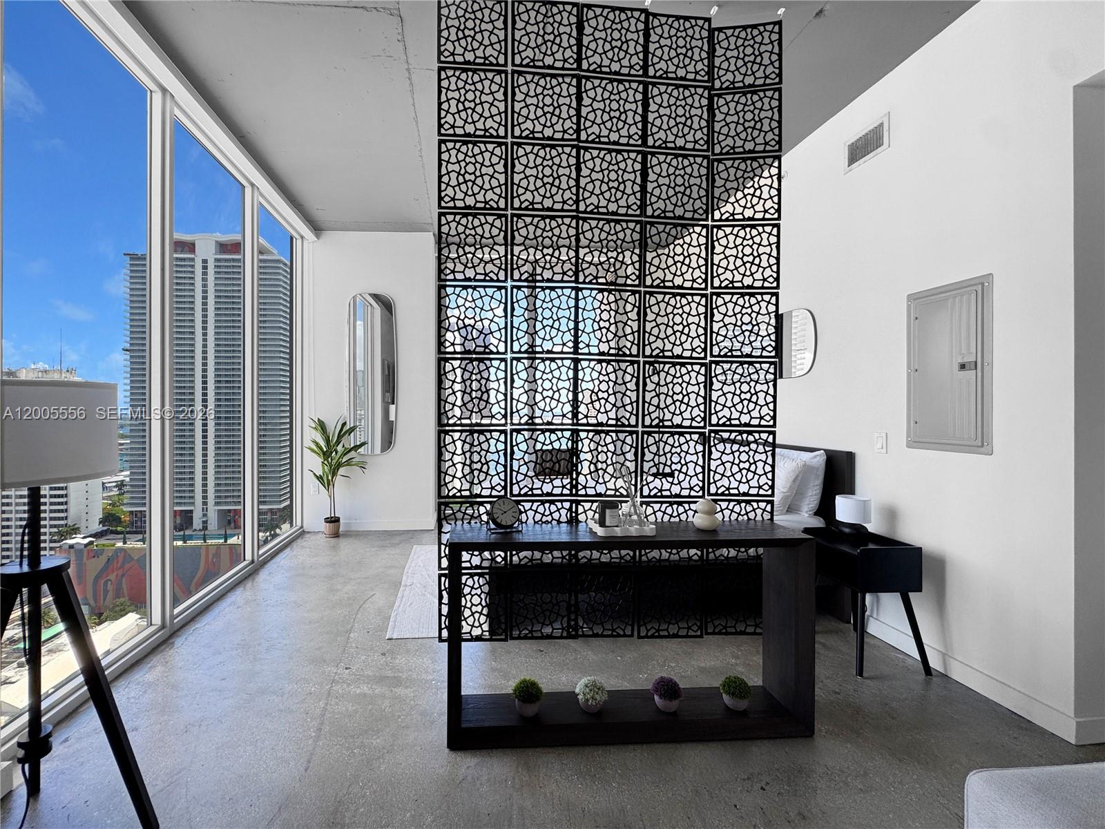 151 Southeast 1st Street, Unit 2702 Miami, FL 33131 - Photo 8 of 29 a view of livingroom with furniture