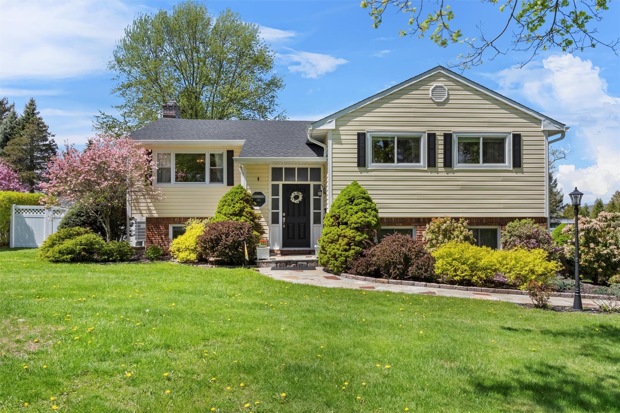 3189 Quinlan Street Yorktown Heights, NY 10598 - Photo 1 of 20 a front view of house with yard and green space