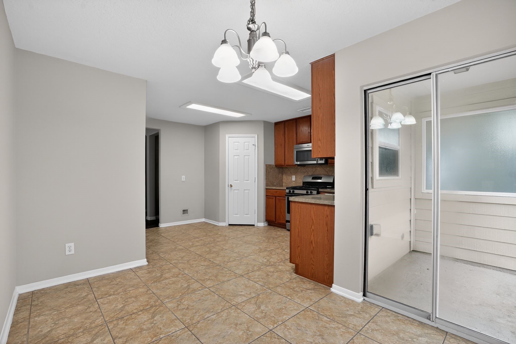 29414 Winton Wood Way Spring, TX 77386 - Photo 6 of 35 a view of a kitchen with a refrigerator and a sink