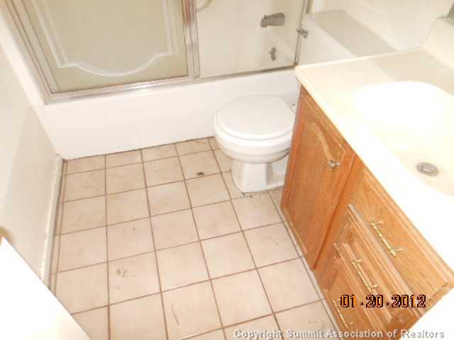 465 4 O Clock Road, Unit 3 Breckenridge, CO 80424 - Photo 3 of 9 a bathroom with a toilet and a bathtub