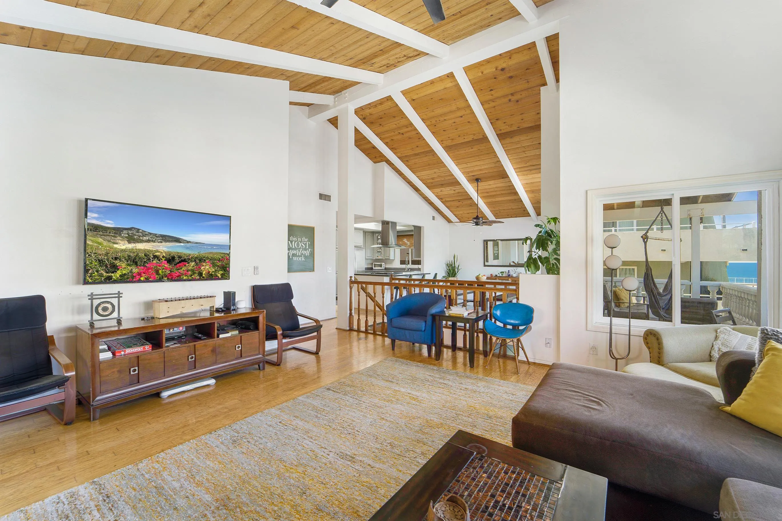 149 Walnut Avenue Carlsbad, CA 92008 - Photo 13 of 48 a living room with furniture and a flat screen tv