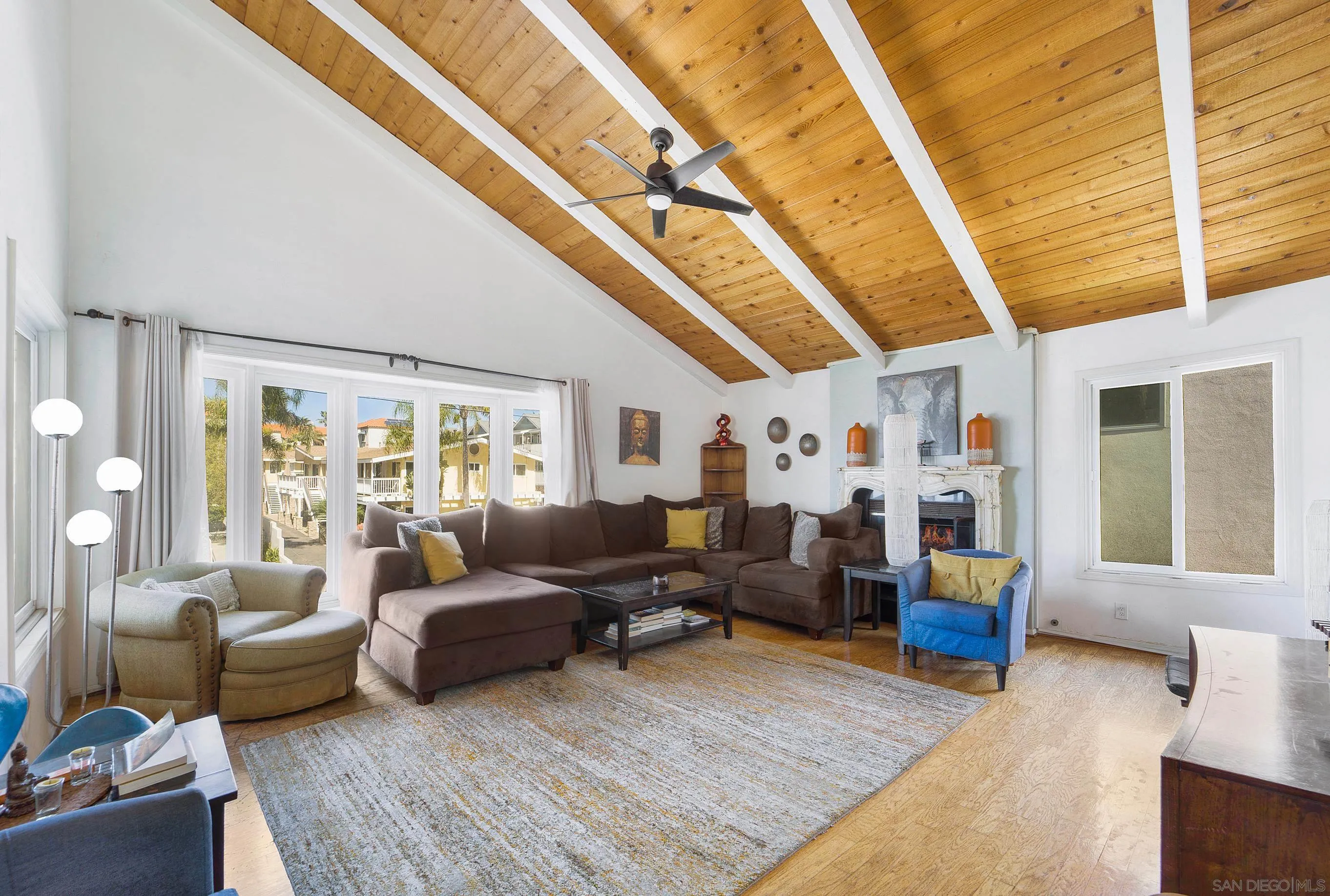 149 Walnut Avenue Carlsbad, CA 92008 - Photo 15 of 48 a living room with furniture fireplace and a large window