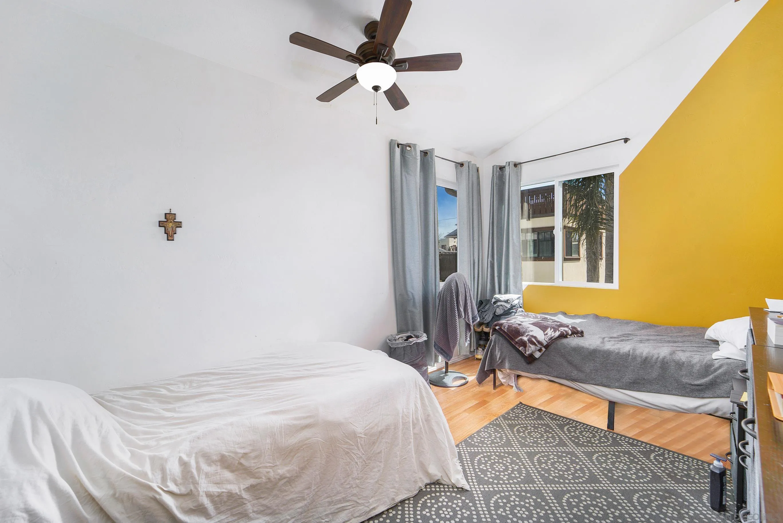 149 Walnut Avenue Carlsbad, CA 92008 - Photo 25 of 48 a bedroom with a bed dresser and a window