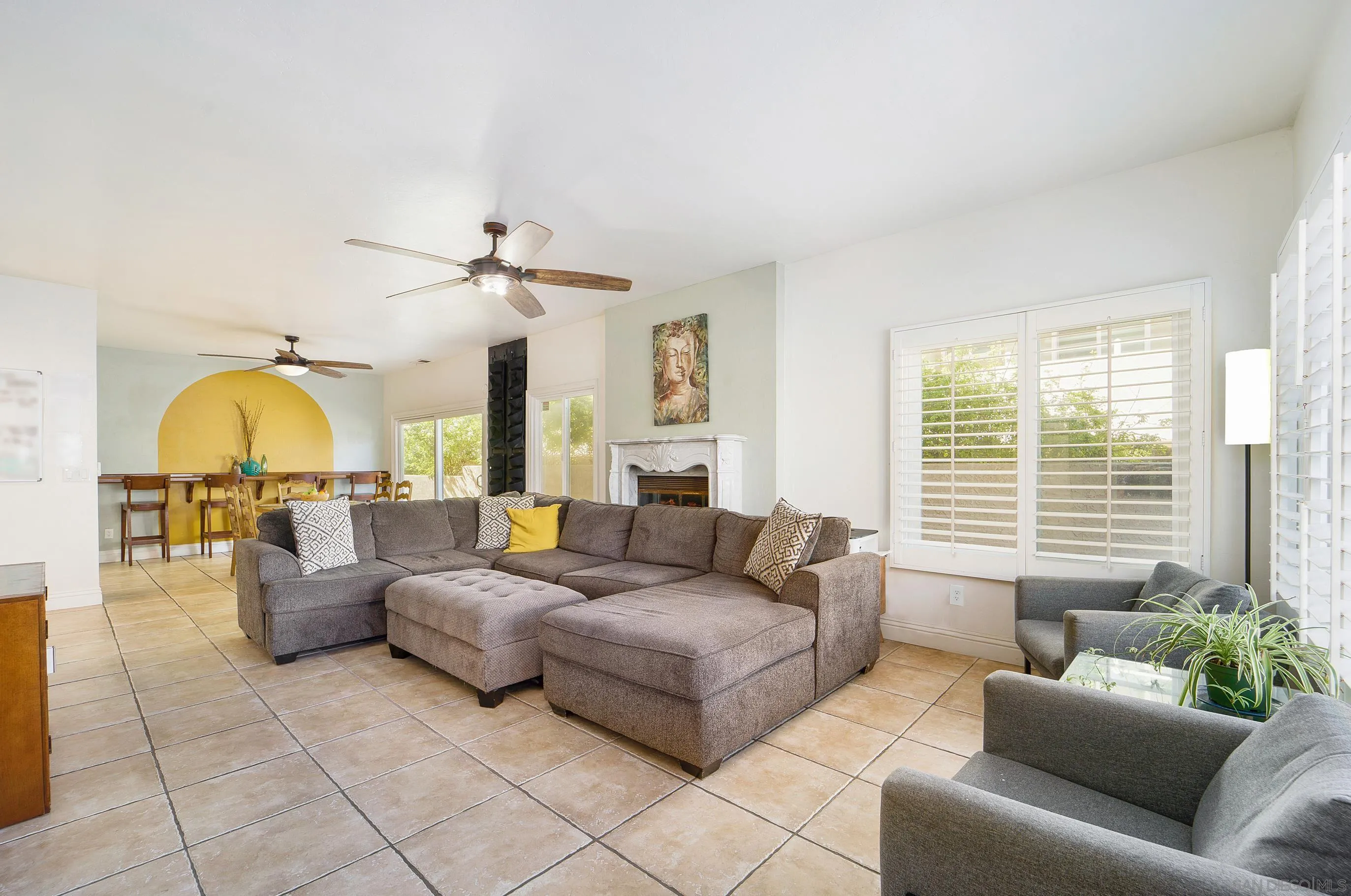 149 Walnut Avenue Carlsbad, CA 92008 - Photo 26 of 48 a living room with furniture and a large window
