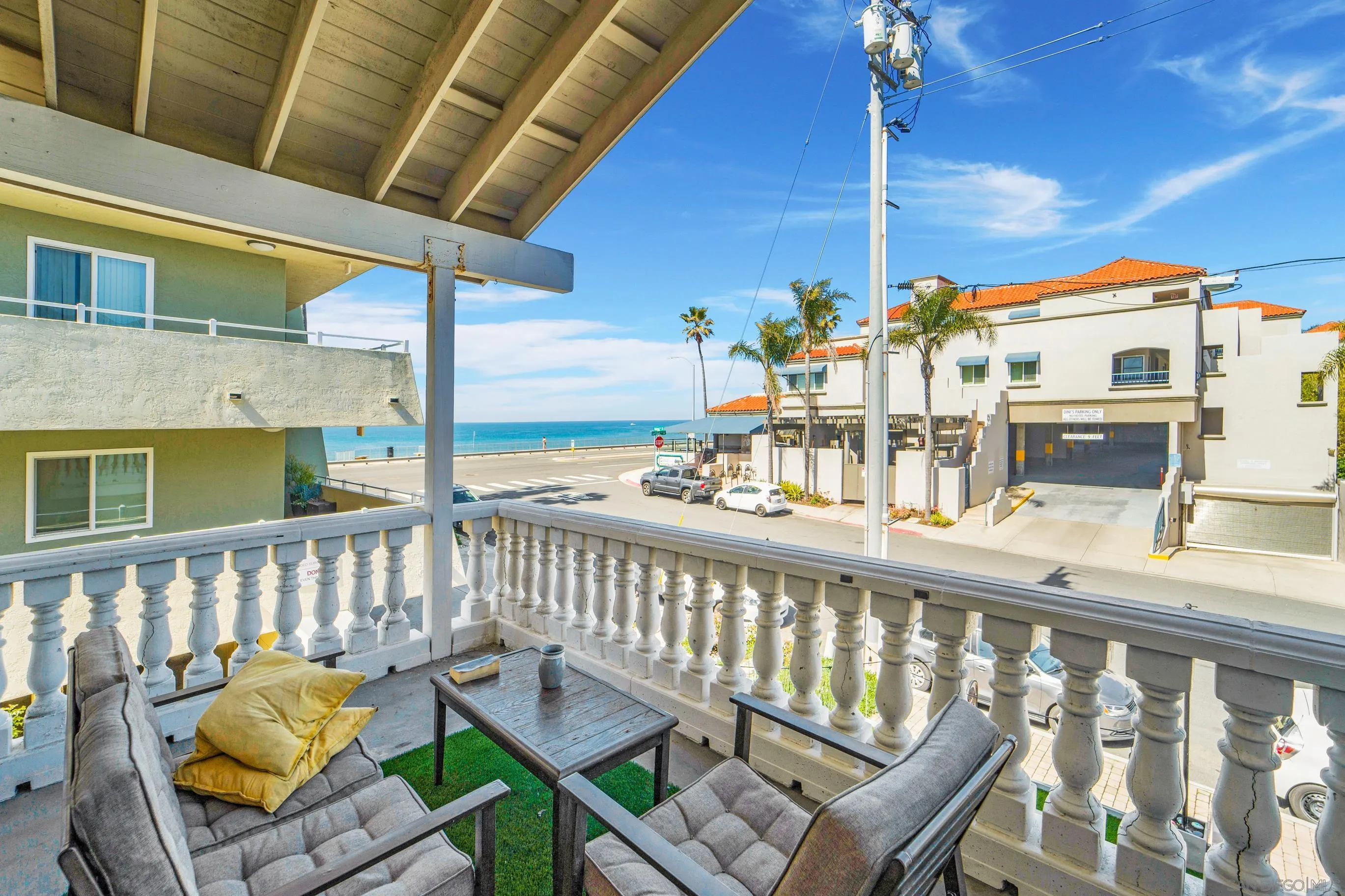 149 Walnut Avenue Carlsbad, CA 92008 - Photo 6 of 48 a view of a balcony with chairs