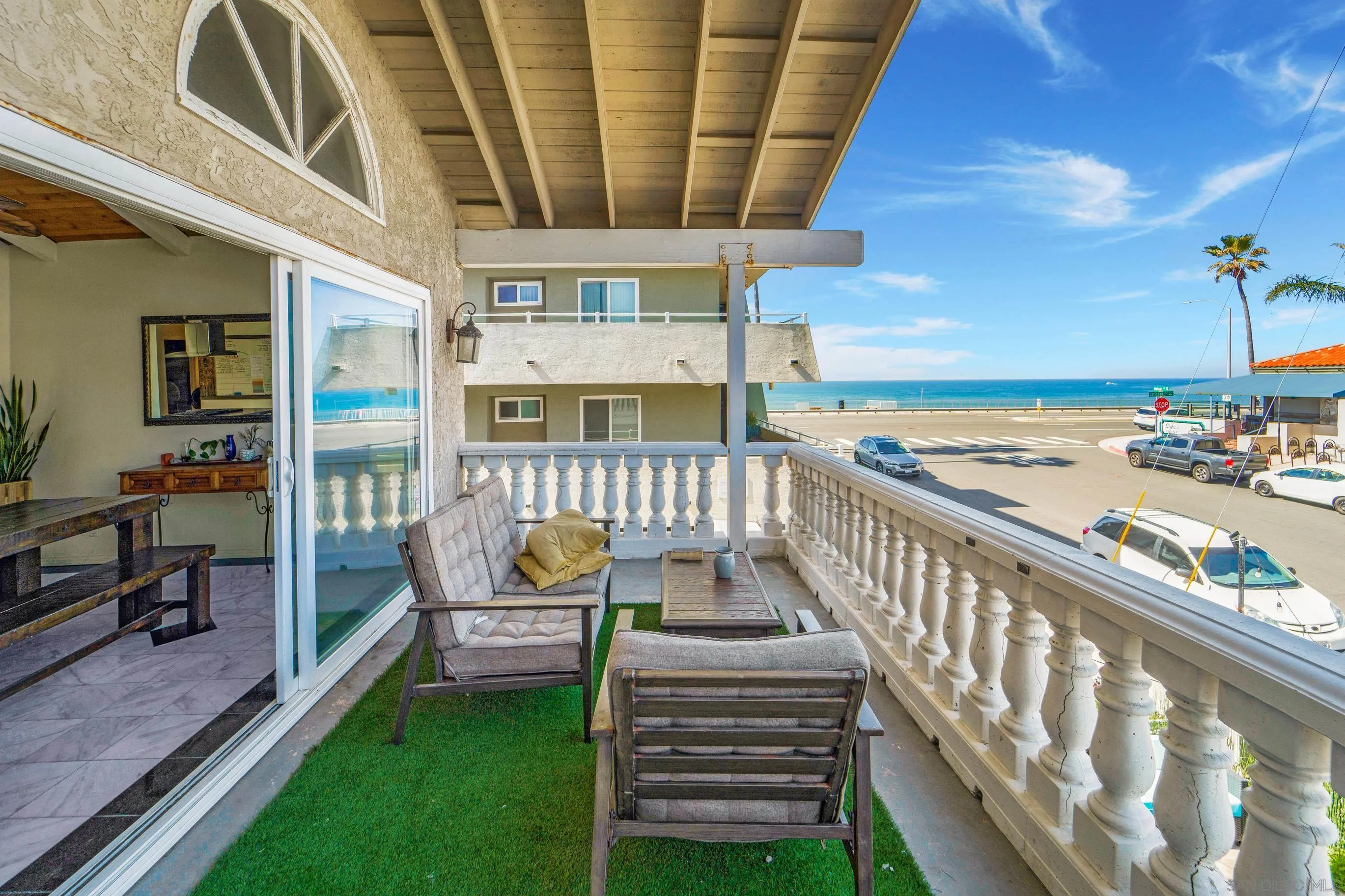 149 Walnut Avenue Carlsbad, CA 92008 - Photo 7 of 48 a view of a chairs and table in the balcony