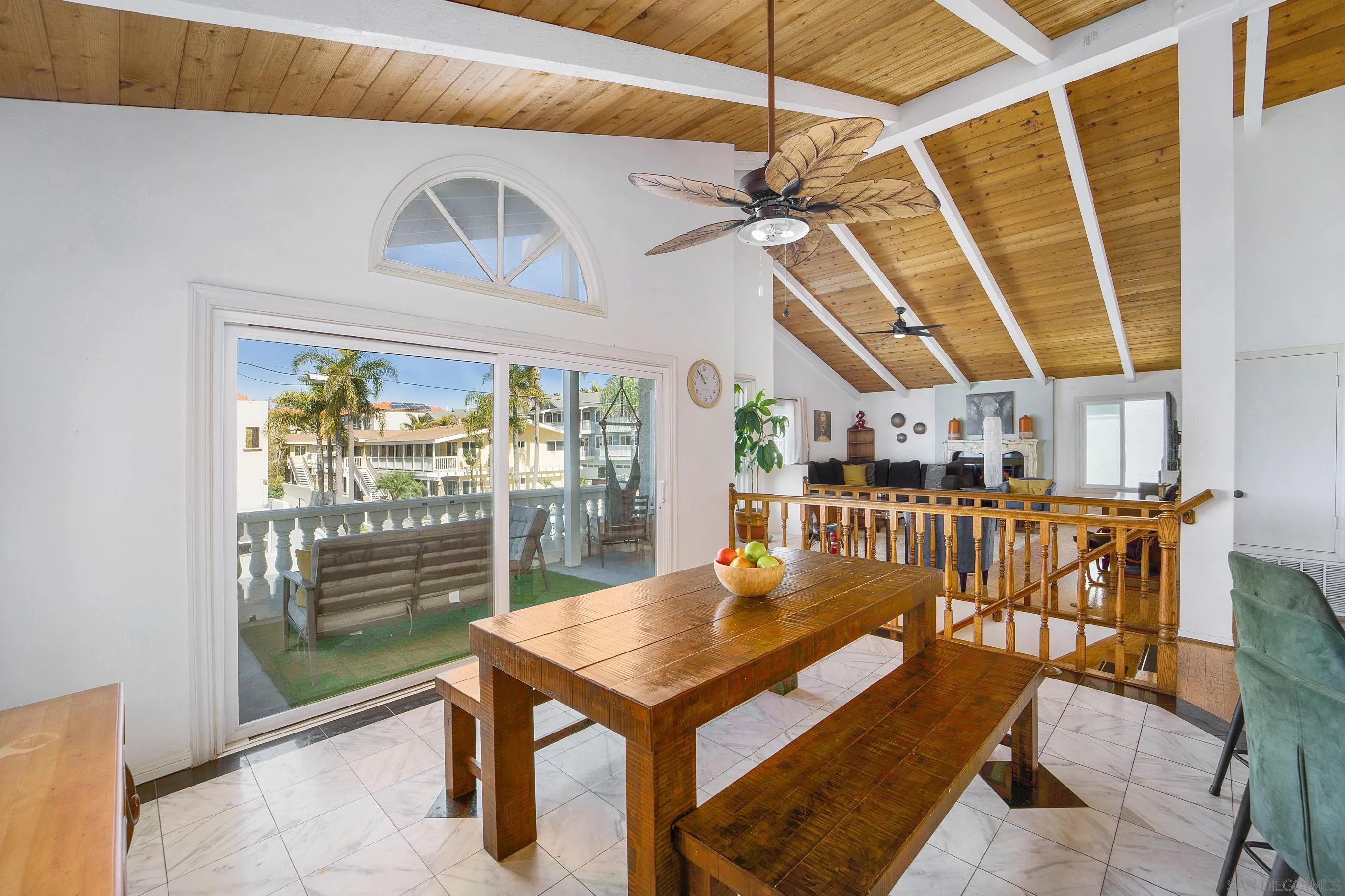 149 Walnut Avenue Carlsbad, CA 92008 - Photo 10 of 48 a view of a balcony with table and chairs