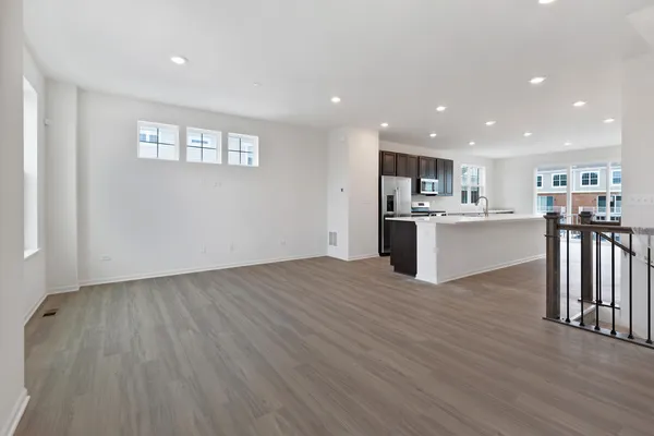 a view of kitchen with wooden floor
