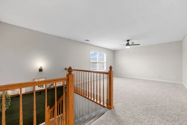 a view of hallway with stairs