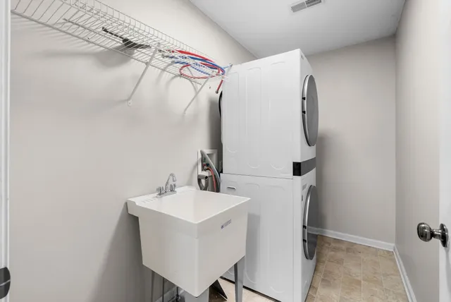 a bathroom with a sink and mirror