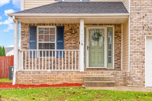 a view of a house with a large window