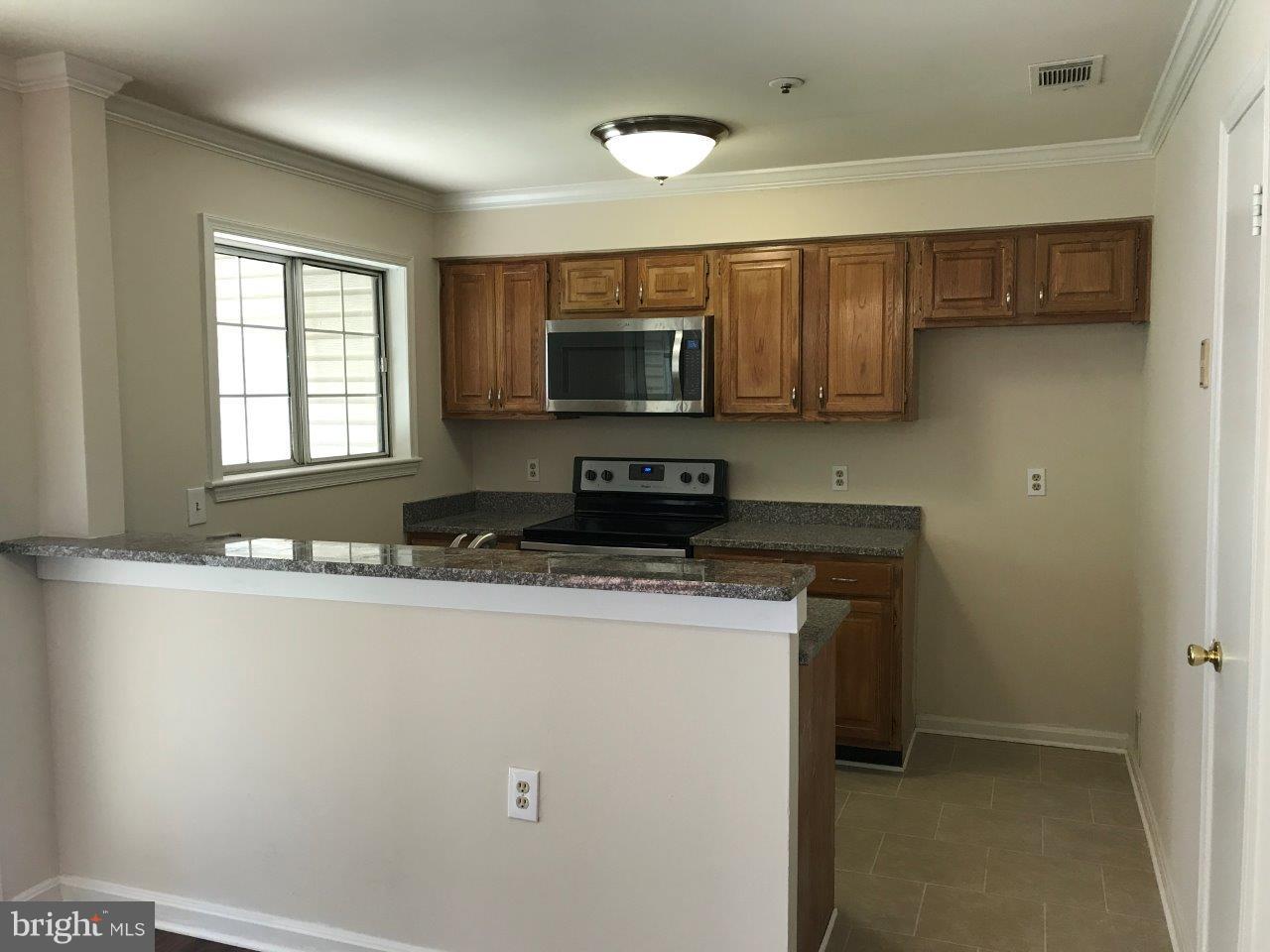 7804 Spinnaker Road, Unit 534 Laurel, MD 20707 - Photo 10 of 19 Kitchen