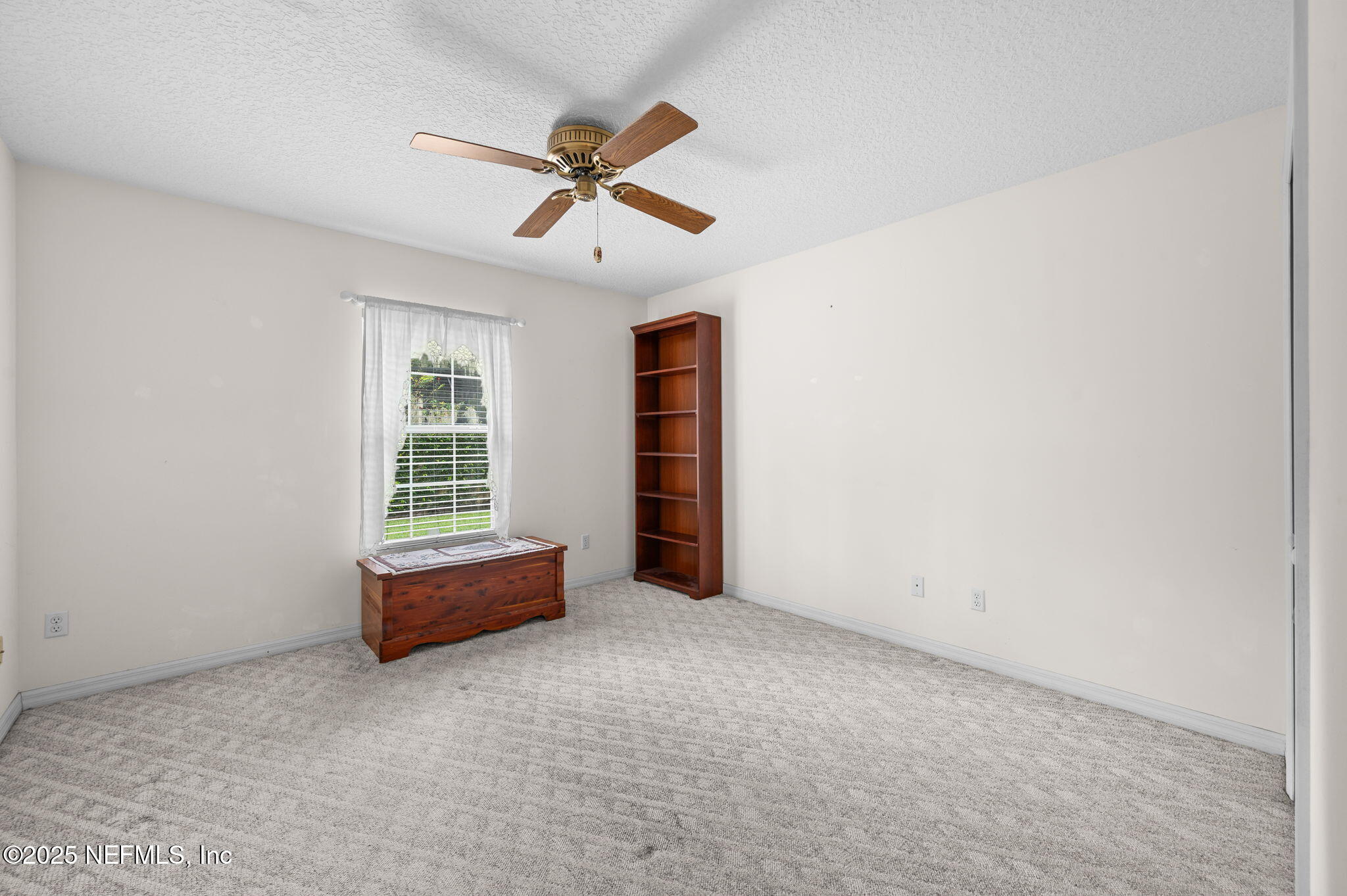 129 Linden Road St. Augustine, FL 32086 - Photo 28 of 56 a view of an empty room with a window