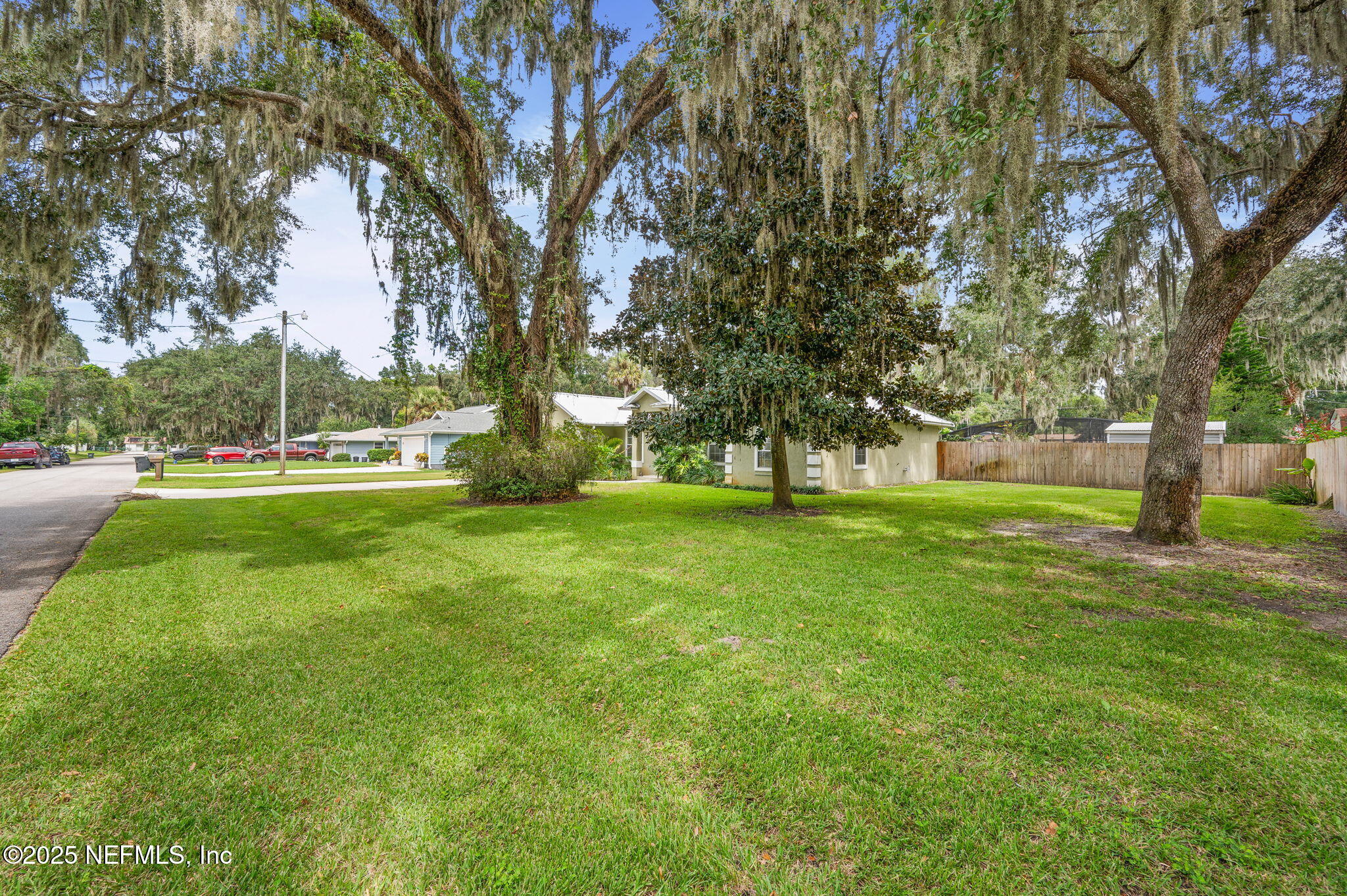 129 Linden Road St. Augustine, FL 32086 - Photo 3 of 56 a view of yard with trees and grass