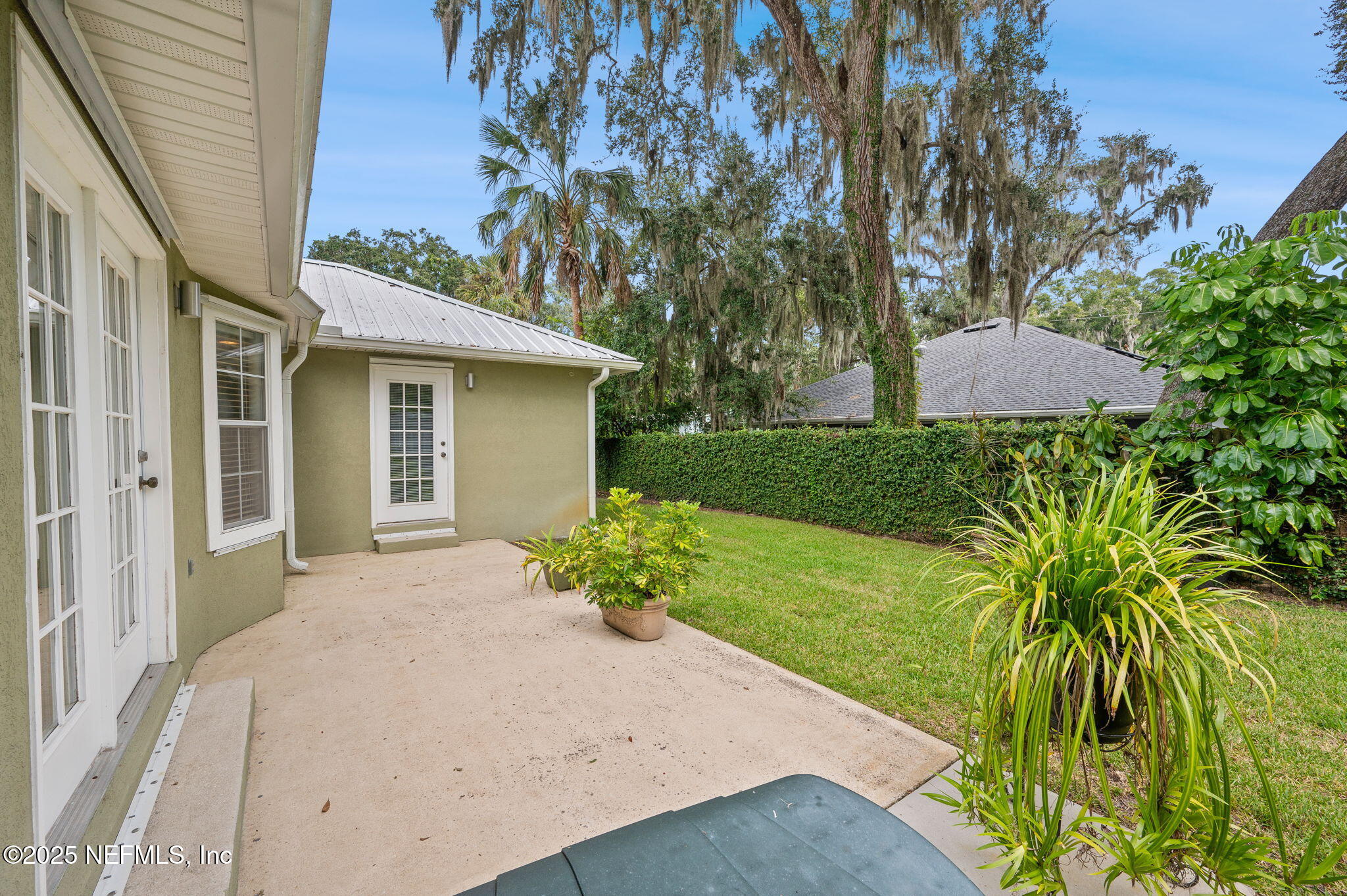 129 Linden Road St. Augustine, FL 32086 - Photo 33 of 56 a front view of a house with a yard and garage