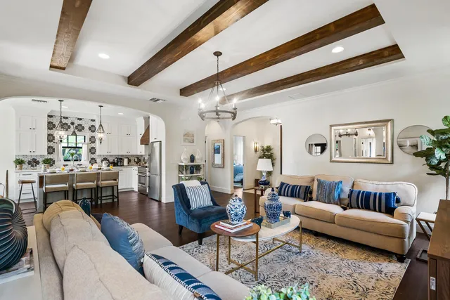 a living room with furniture and a table