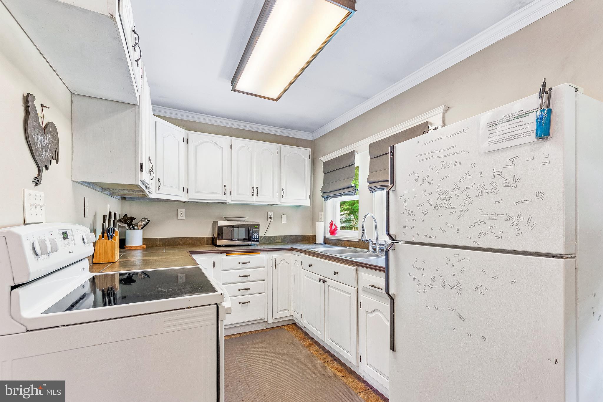 10035 H G Trueman Road Lusby, MD 20657 - Photo 12 of 38 Eat in kitchen