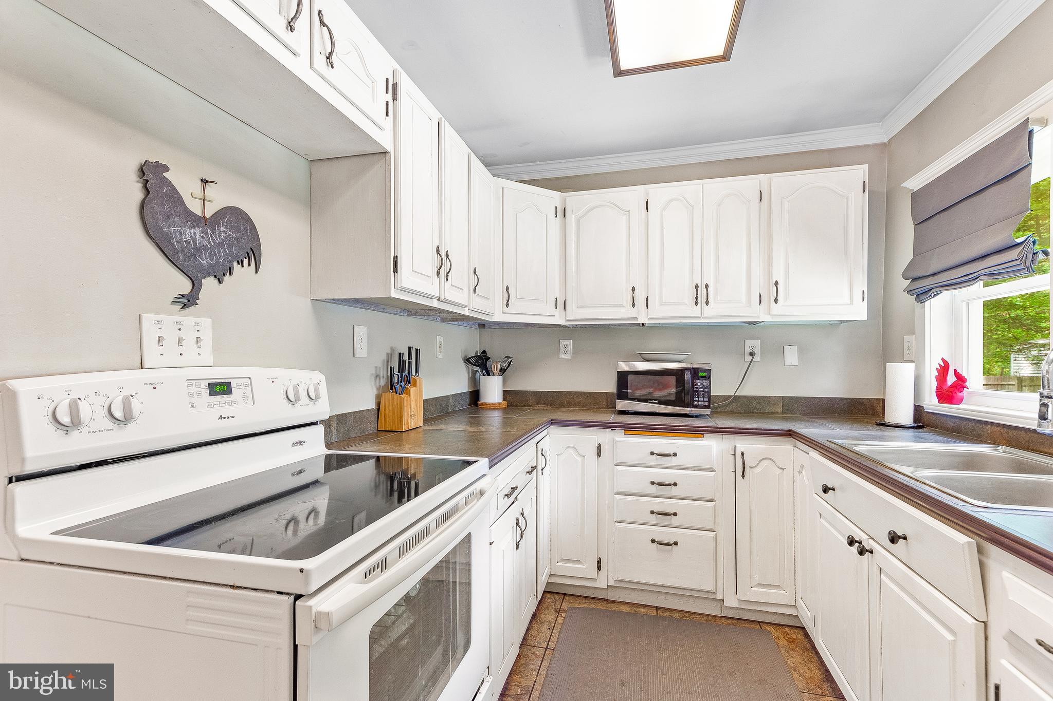 10035 H G Trueman Road Lusby, MD 20657 - Photo 13 of 38 Lots of cabinet space