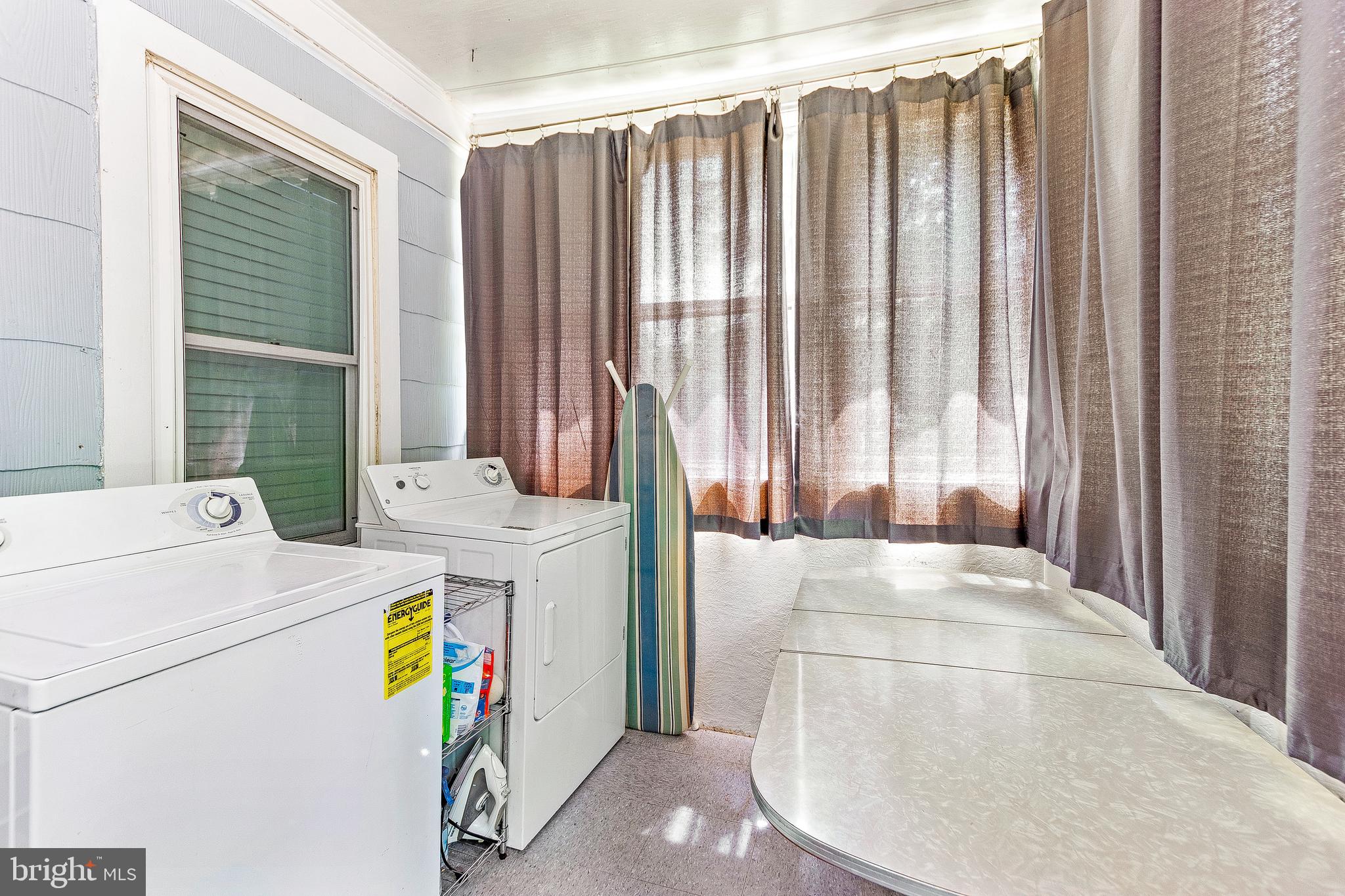 10035 H G Trueman Road Lusby, MD 20657 - Photo 20 of 38 Laundry and table provided