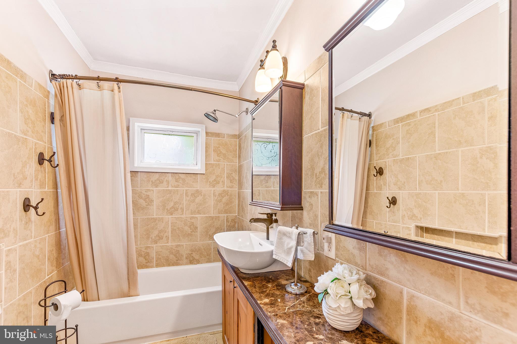 10035 H G Trueman Road Lusby, MD 20657 - Photo 23 of 38 Beautiful updated main floor bathroom