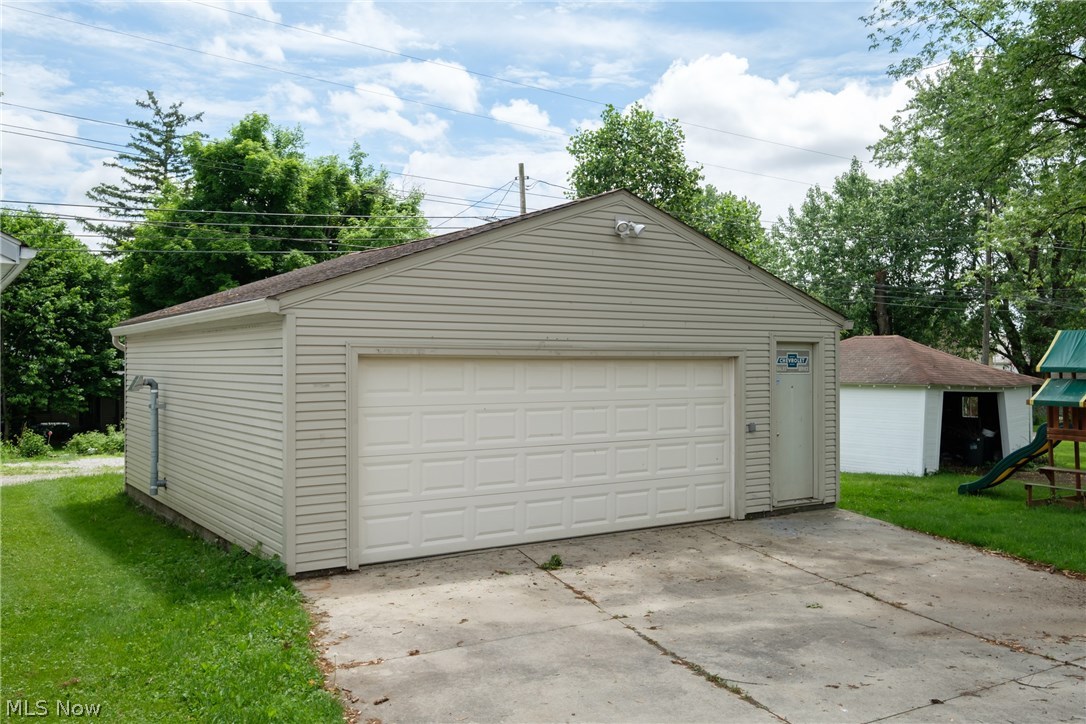 54 South 3rd Street Rittman, OH 44270 - Photo 28 of 29 This two-car, heated garage is perfect for the mechanic or car aficionado!