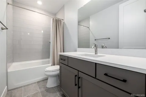 a view of a swimming pool with seating area