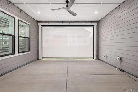 a view of an empty room with windows