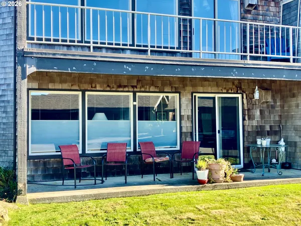 a view of pool with outdoor seating