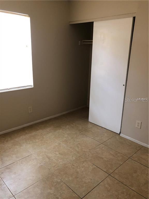 2278 19th Avenue Southwest Largo, FL 33774 - Photo 6 of 11 a view of an empty room