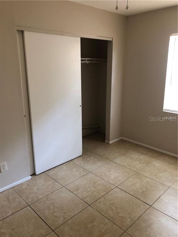 2278 19th Avenue Southwest Largo, FL 33774 - Photo 7 of 11 a view of an empty room