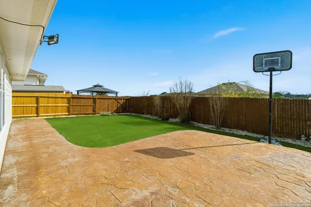 a view of outdoor space and basketball court