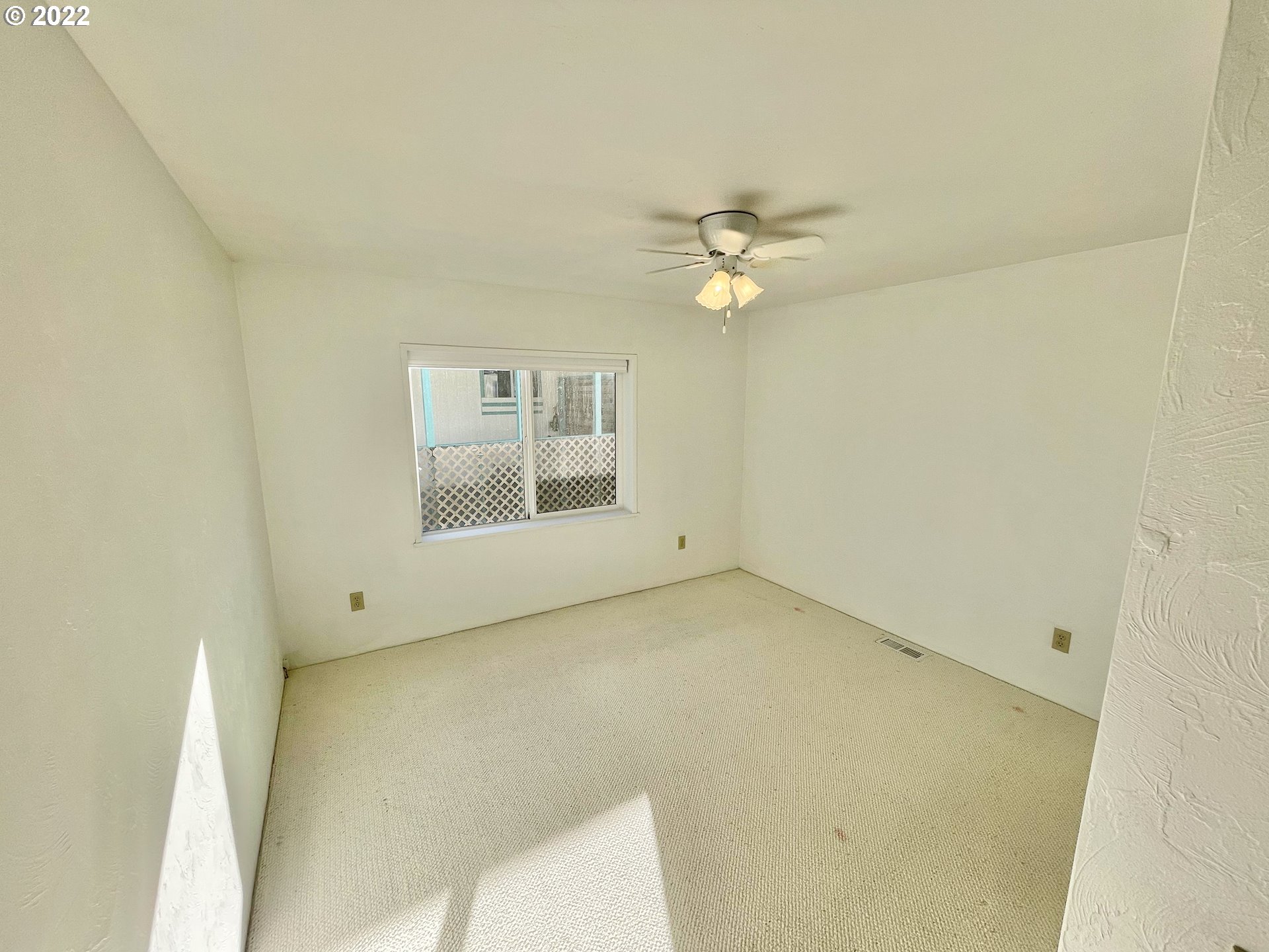100 River Bend Road, Unit 101 Reedsport, OR 97467 - Photo 13 of 30 an empty room with a bathroom