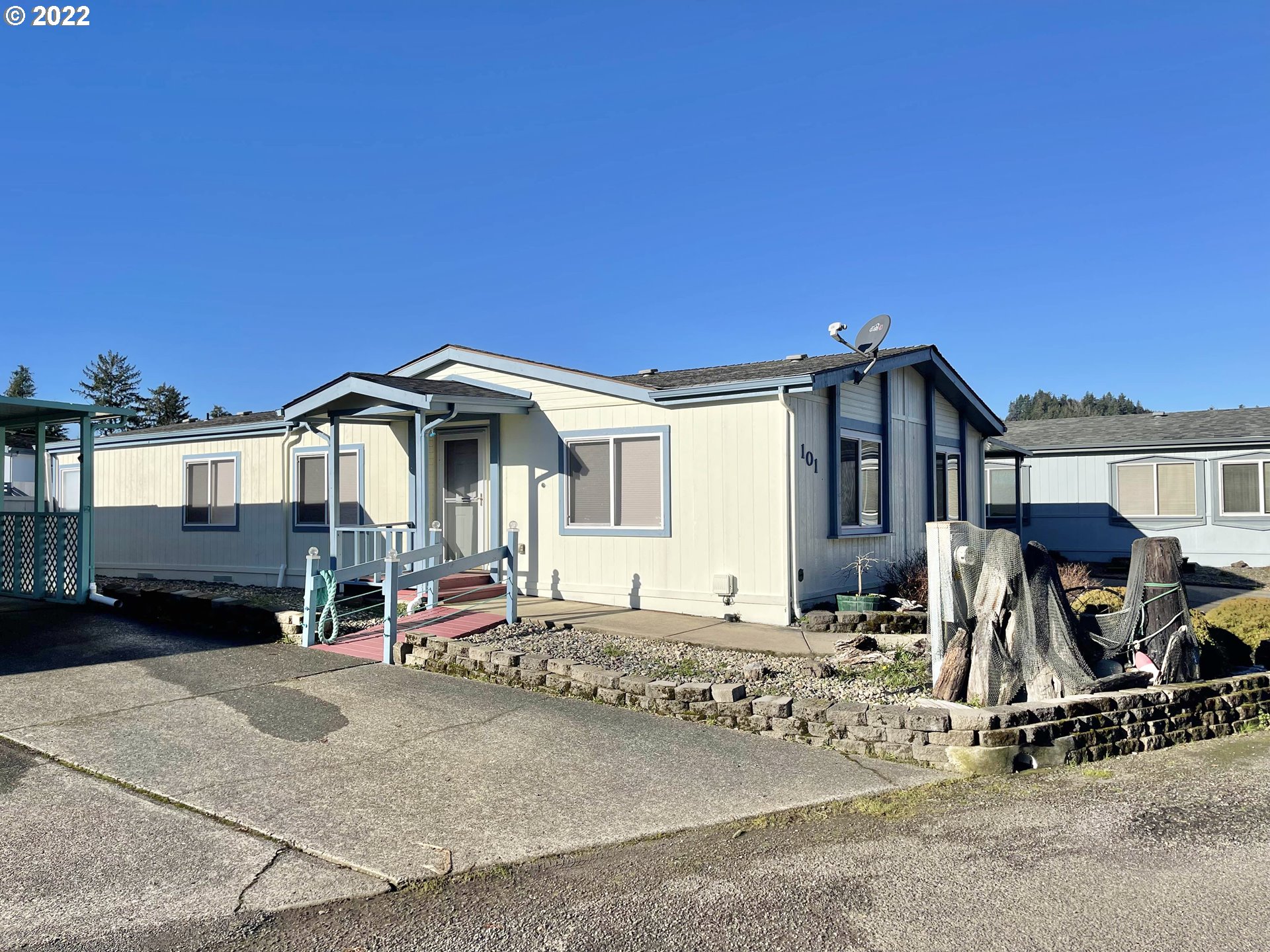 100 River Bend Road, Unit 101 Reedsport, OR 97467 - Photo 23 of 30 a view of a house with patio