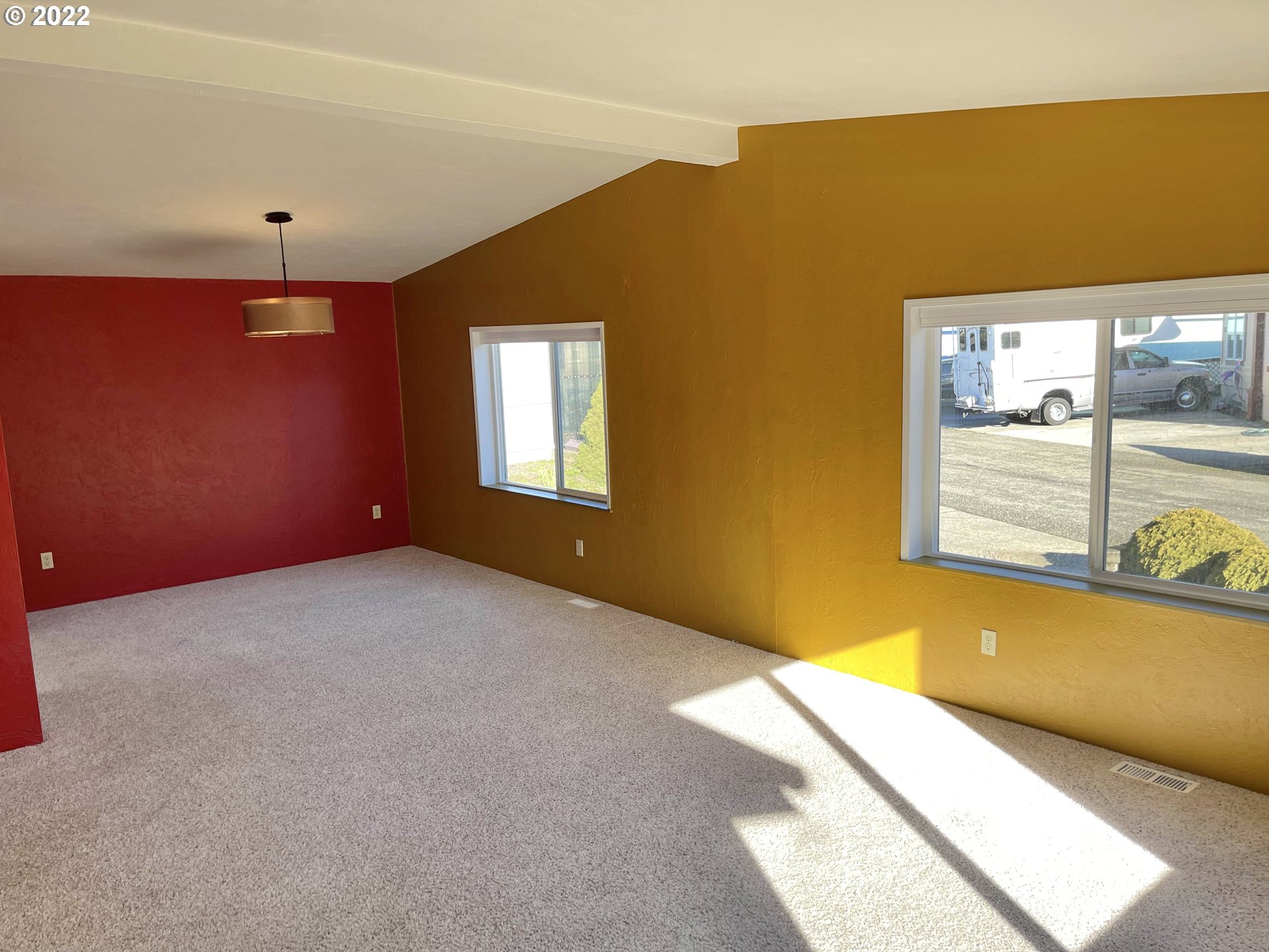 100 River Bend Road, Unit 101 Reedsport, OR 97467 - Photo 7 of 30 a view of an empty room with a window