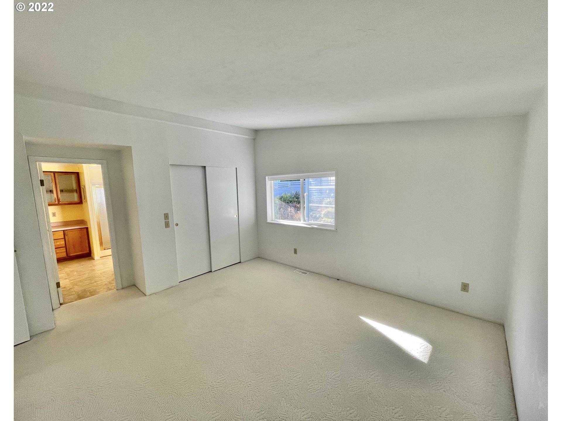 100 River Bend Road, Unit 101 Reedsport, OR 97467 - Photo 10 of 30 an empty room with windows