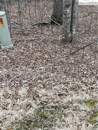 a large stone wall with a shower