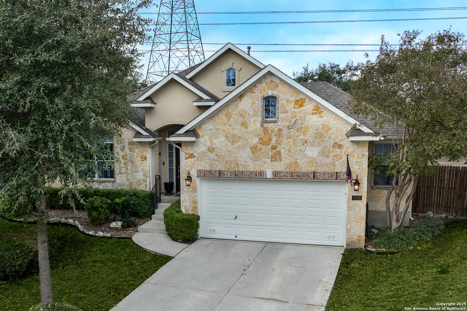9026 Colfax Helotes, TX 78023 - Photo 2 of 40 a front view of a house with garden