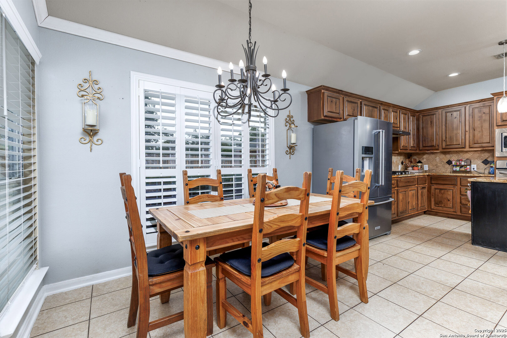 9026 Colfax Helotes, TX 78023 - Photo 23 of 40 a dining room with furniture and window