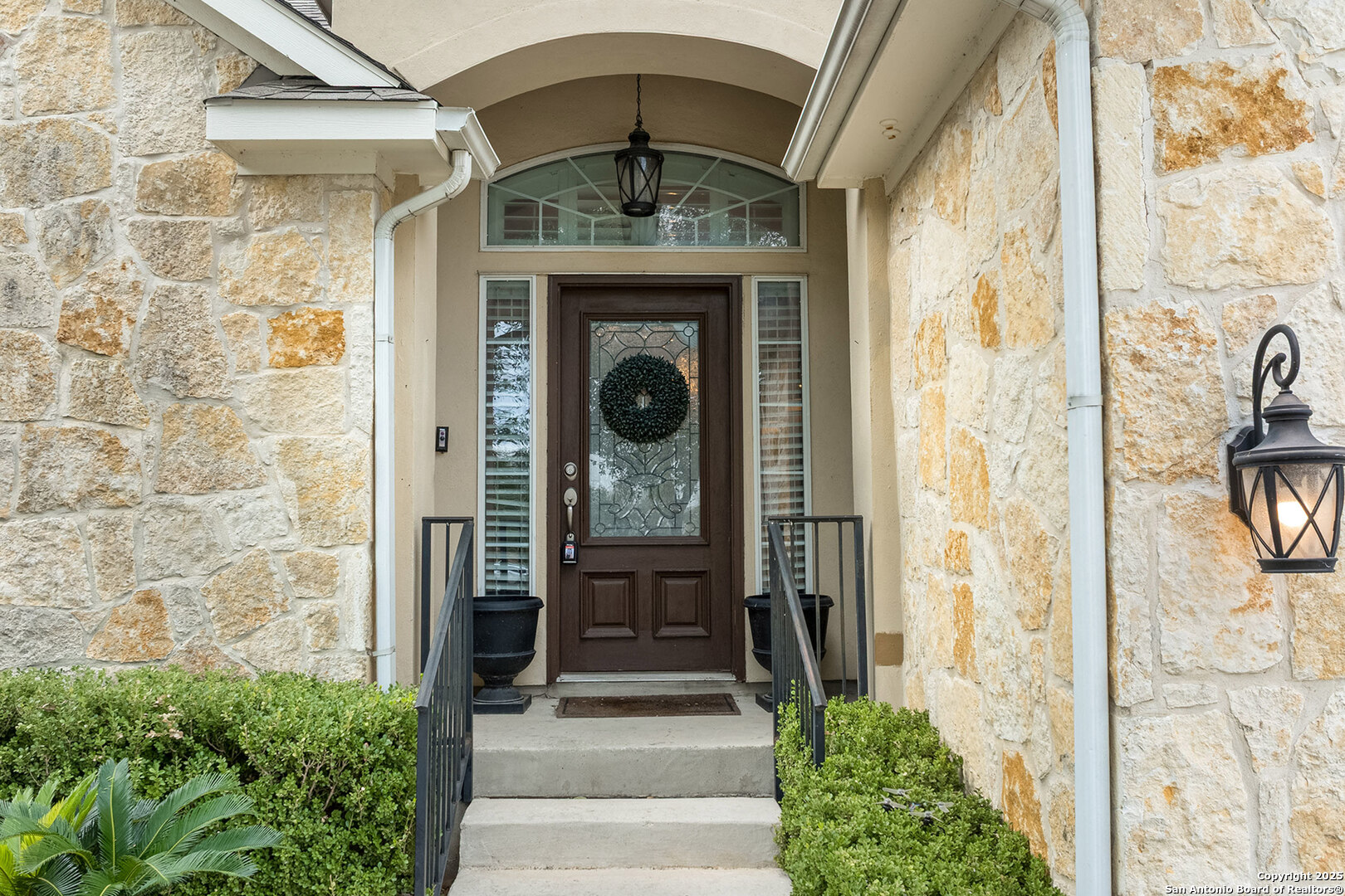 9026 Colfax Helotes, TX 78023 - Photo 3 of 40 a view of a entryway door front of house
