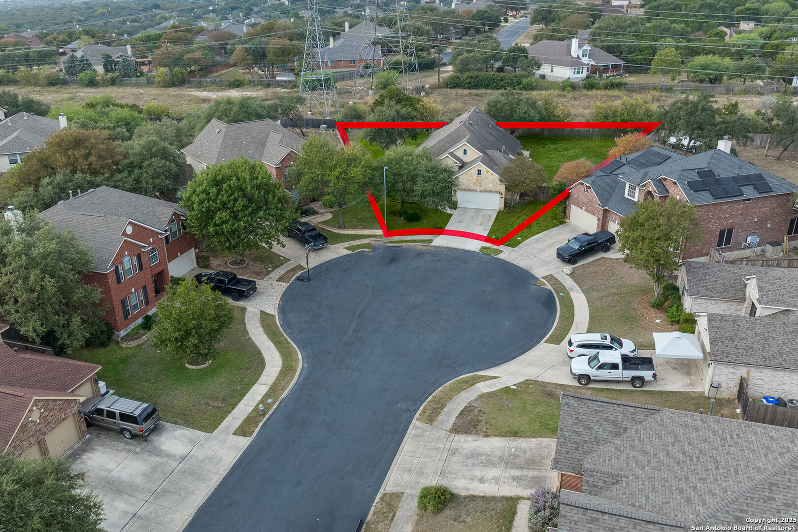9026 Colfax Helotes, TX 78023 - Photo 5 of 40 an aerial view of a swimming pool and outdoor space