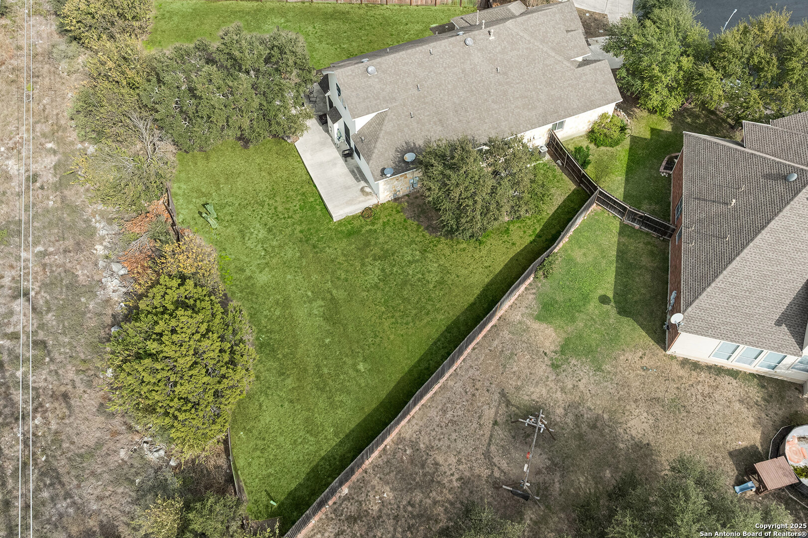 9026 Colfax Helotes, TX 78023 - Photo 6 of 40 a view of a garden from a balcony