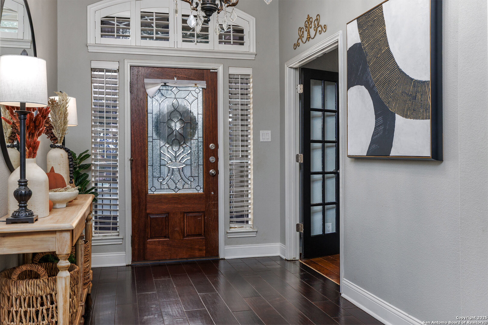 9026 Colfax Helotes, TX 78023 - Photo 9 of 40 a view of a entryway door with wooden floor