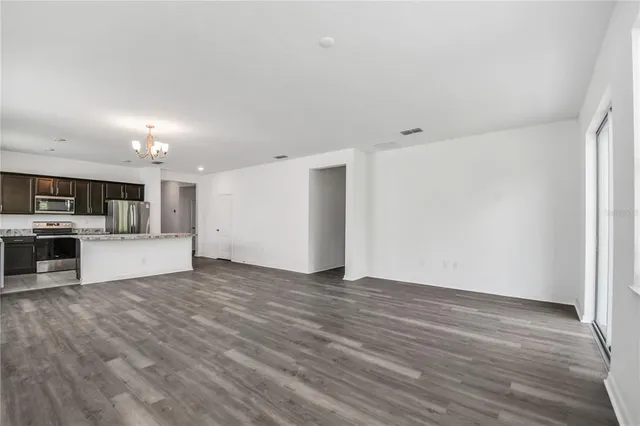 a view of kitchen with wooden floor