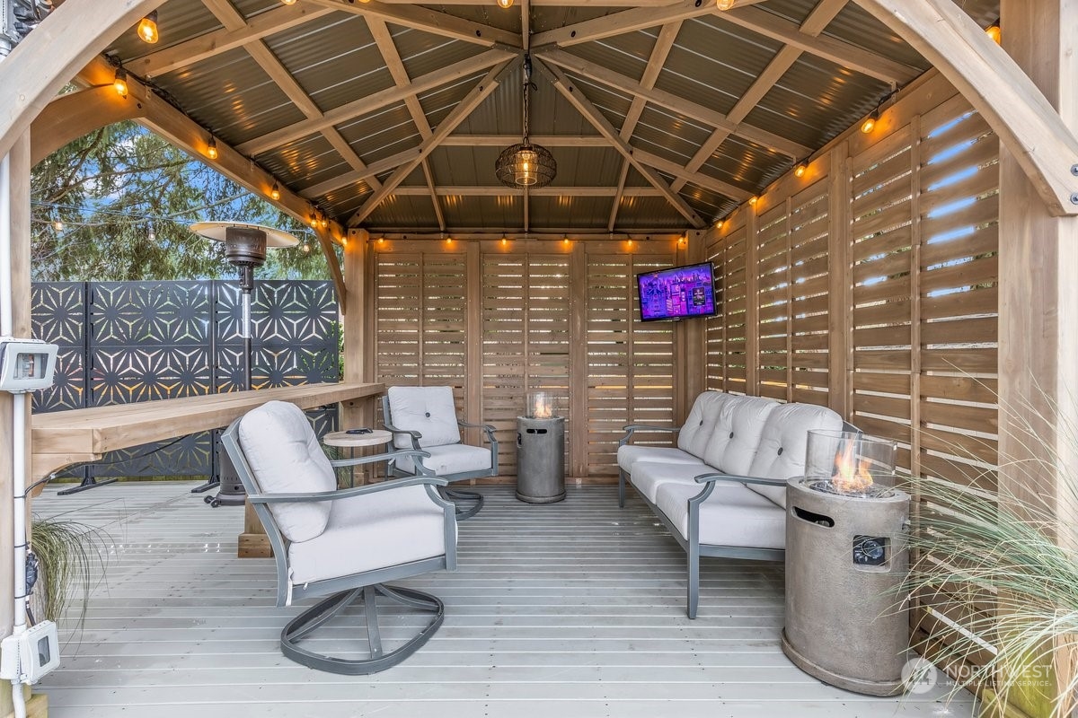 19005 Grannis Road Bothell, WA 98012 - Photo 25 of 31 a view of a chairs and table in a patio